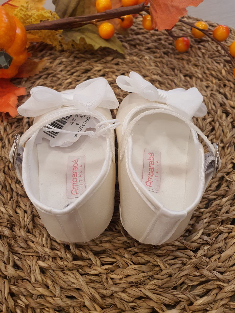 BAMBOLINA BIANCA CON FIOCCO IN TESSUTO AMBARABA'