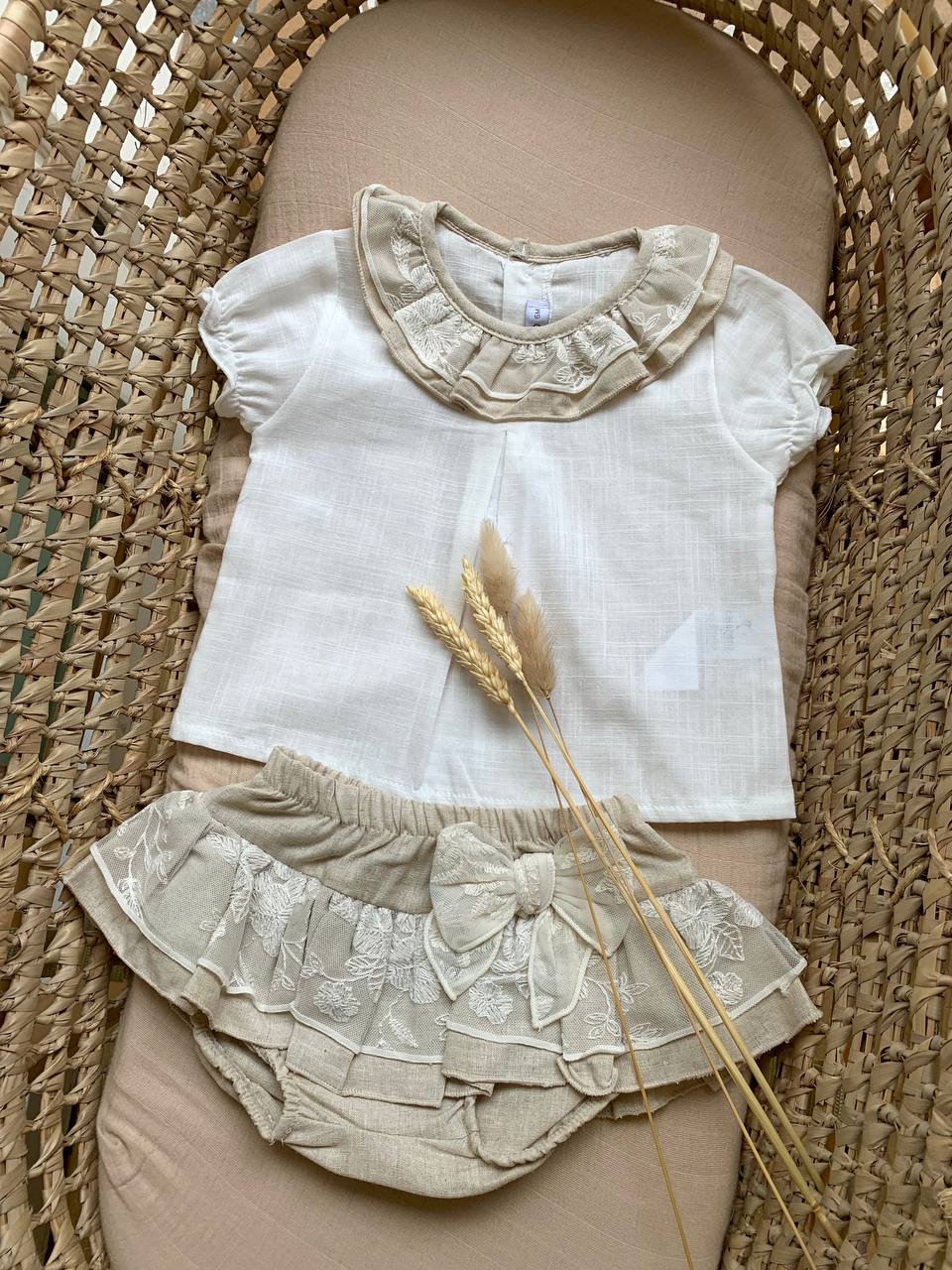 PAGLIACCETTO BEIGE CON FIOCHETTO CALAMARO