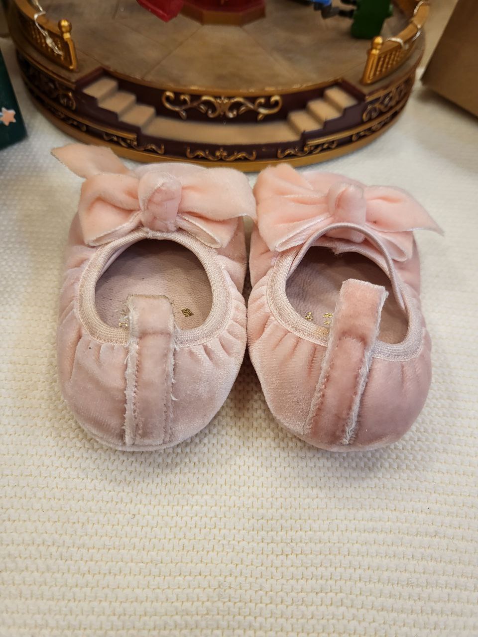 BAMBOLINA IN CAMOSCIO ROSA CON FIOCCO INDICE