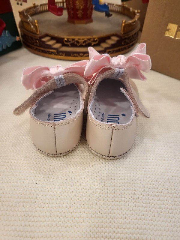 BAMBOLINA ROSA CON FIOCCO ALLA CAVIGLIA INDICE