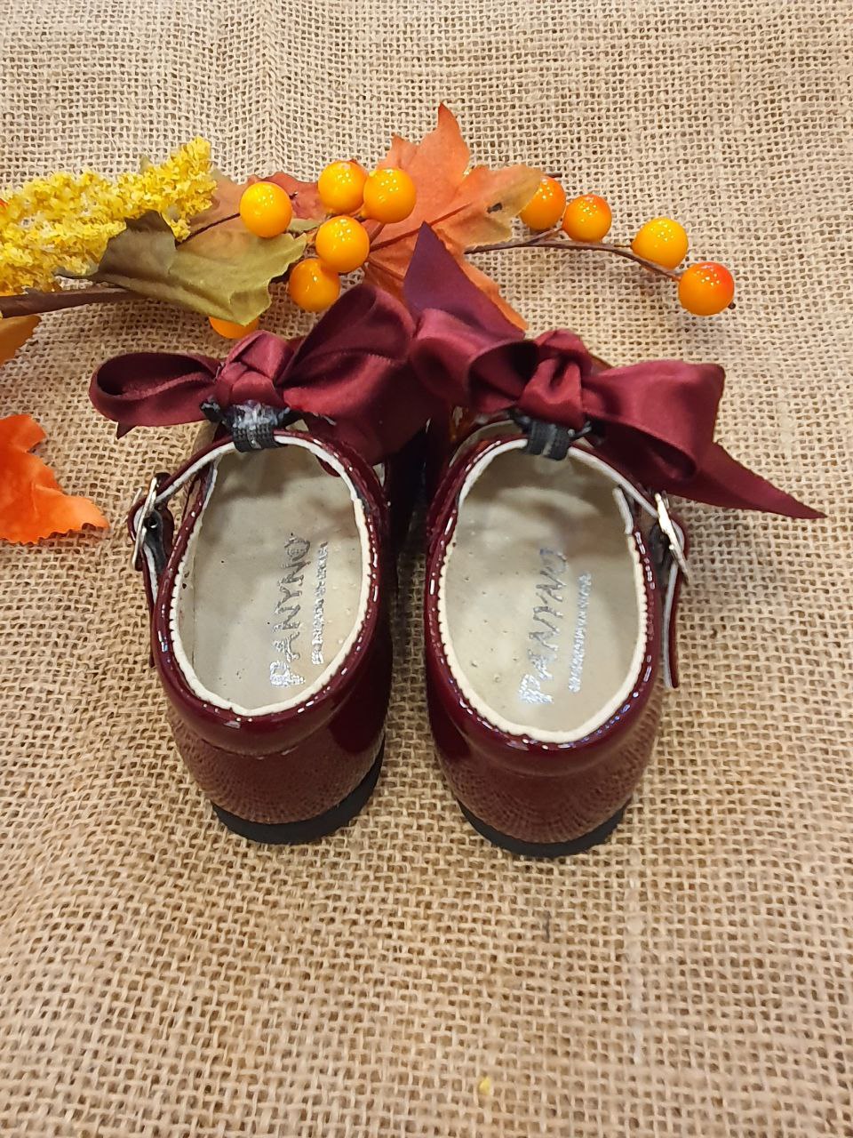 OCCHIELLO LUCIDO CON FIOCCO BORDEAUX PANYNO