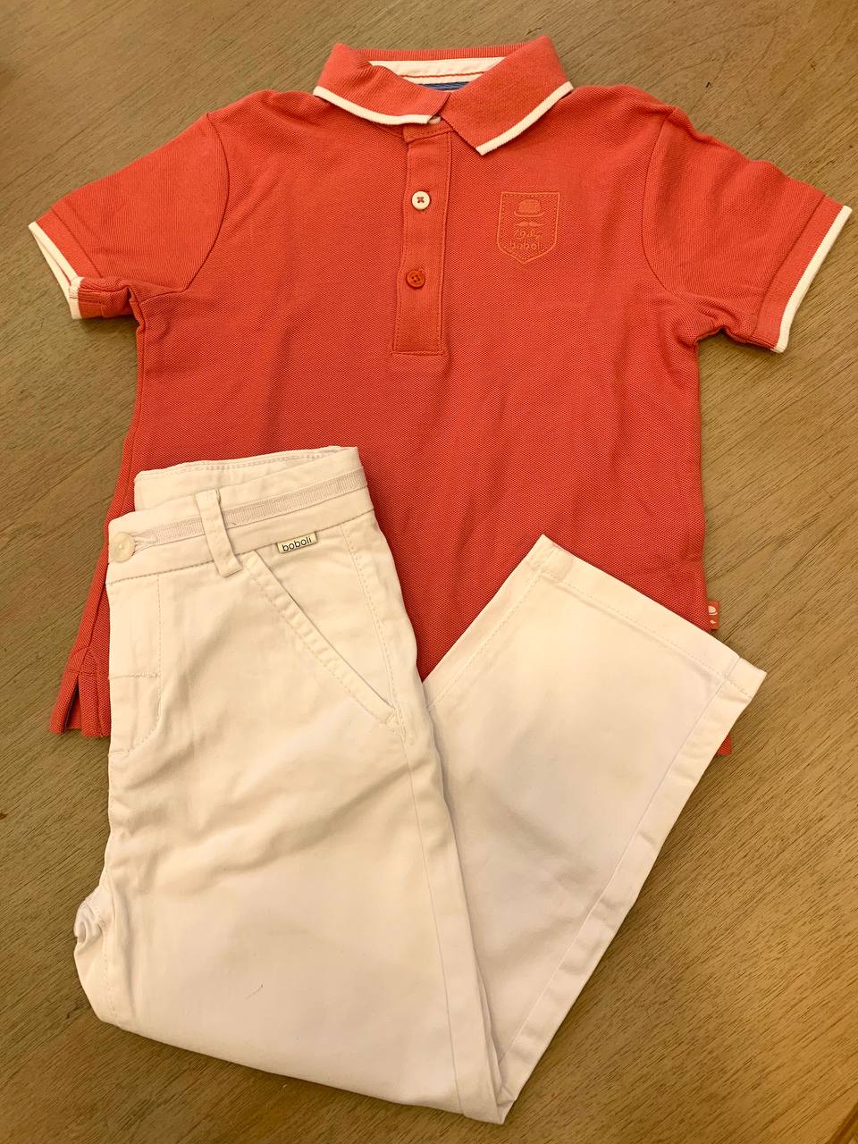 Completo polo salmone e pantalone boboli