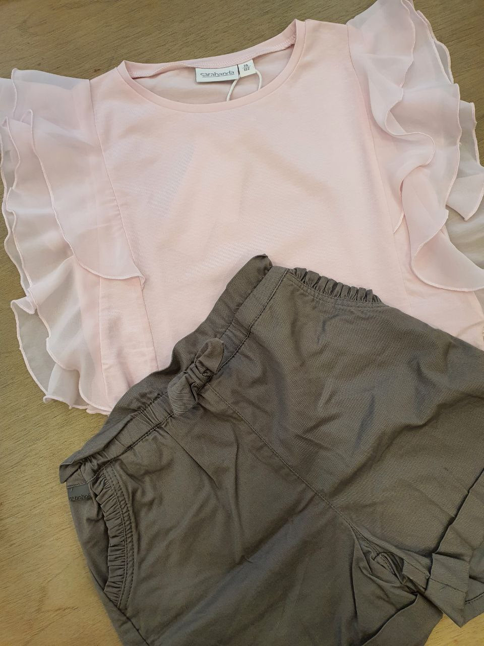 Completo t-shirt rosa e shorts