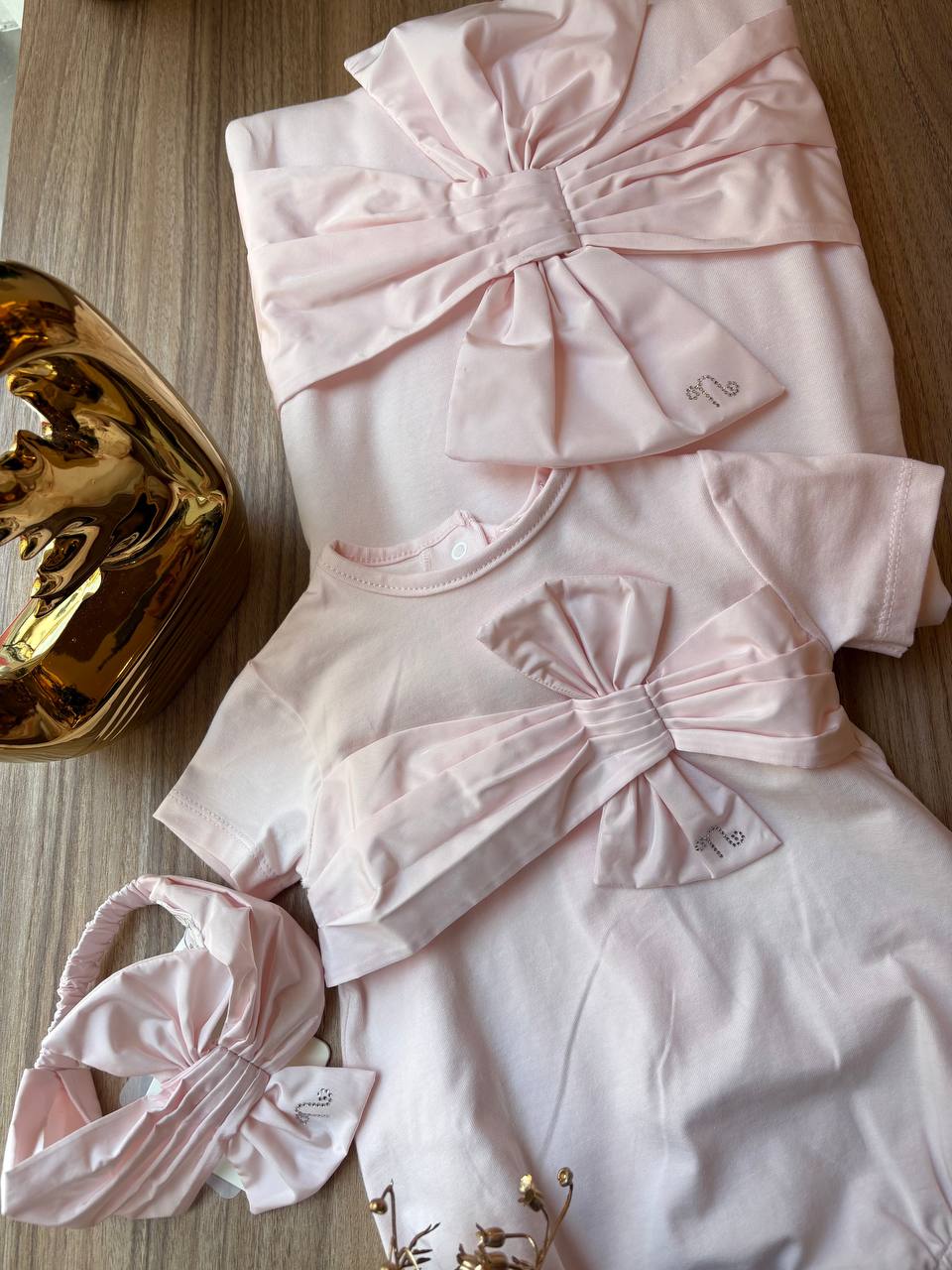 PAGLIACCETTO ROSA CON FIOCCO NANÁN