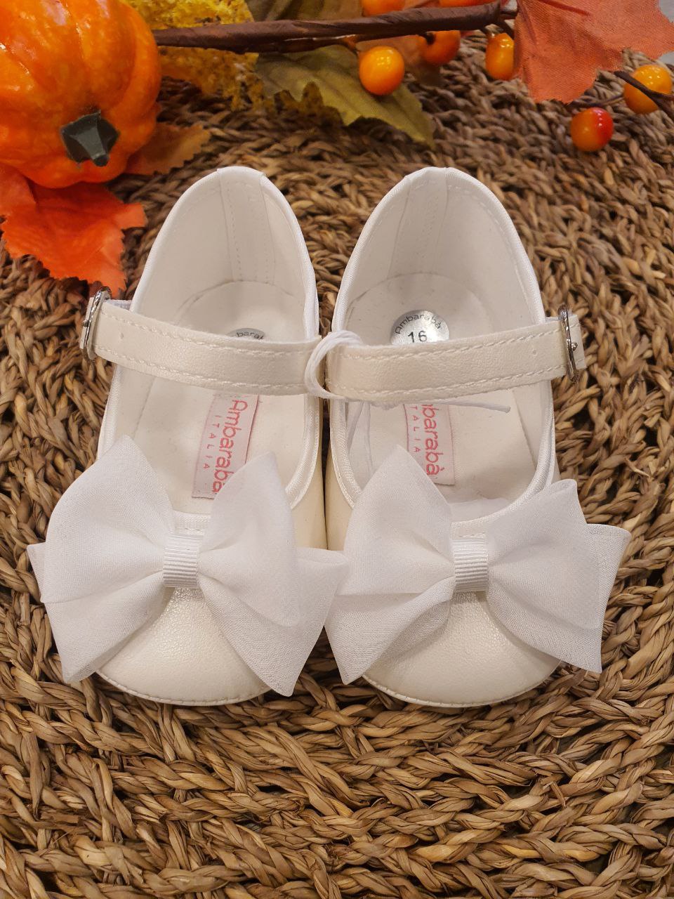 BAMBOLINA BIANCA CON FIOCCO IN TESSUTO AMBARABA'