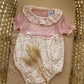 PAGLIACCETTO ROSA PUNTO SMOCK CON FIORELLINI SARDON