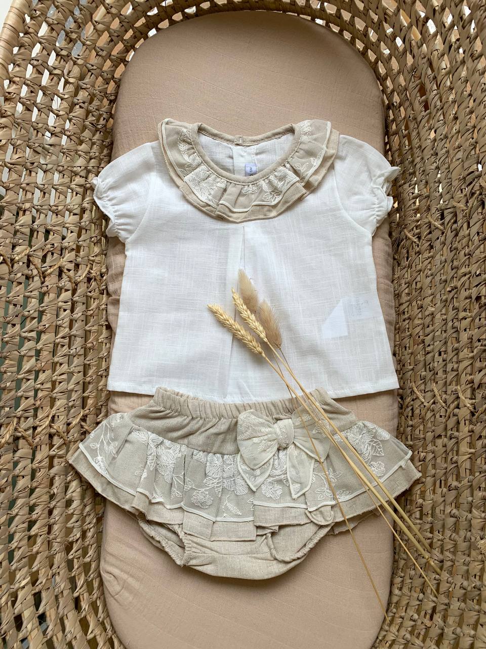PAGLIACCETTO BEIGE CON FIOCHETTO CALAMARO