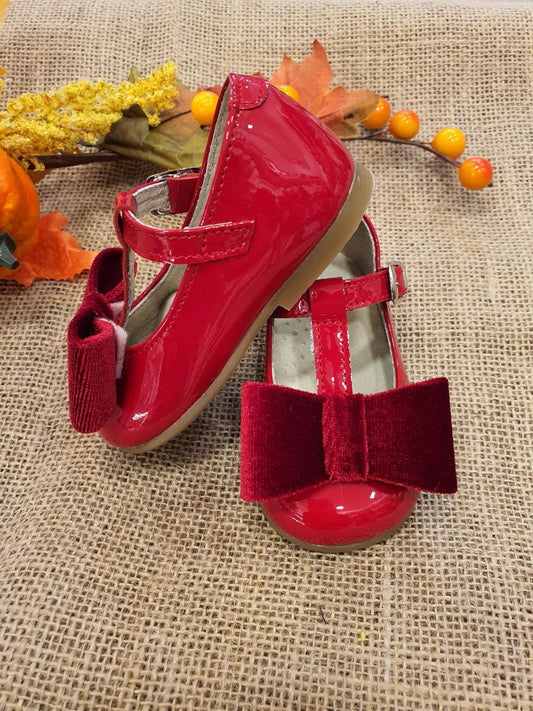 BAMBOLINA LUCIDA CON FIOCCO IN VELLUTO PANYNO