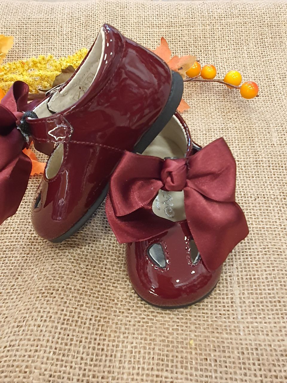 OCCHIELLO LUCIDO CON FIOCCO BORDEAUX PANYNO