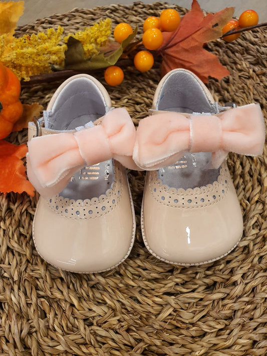 BAMBOLINA LUCIDA CON FIOCCO IN VELLUTO ROSA INDICE