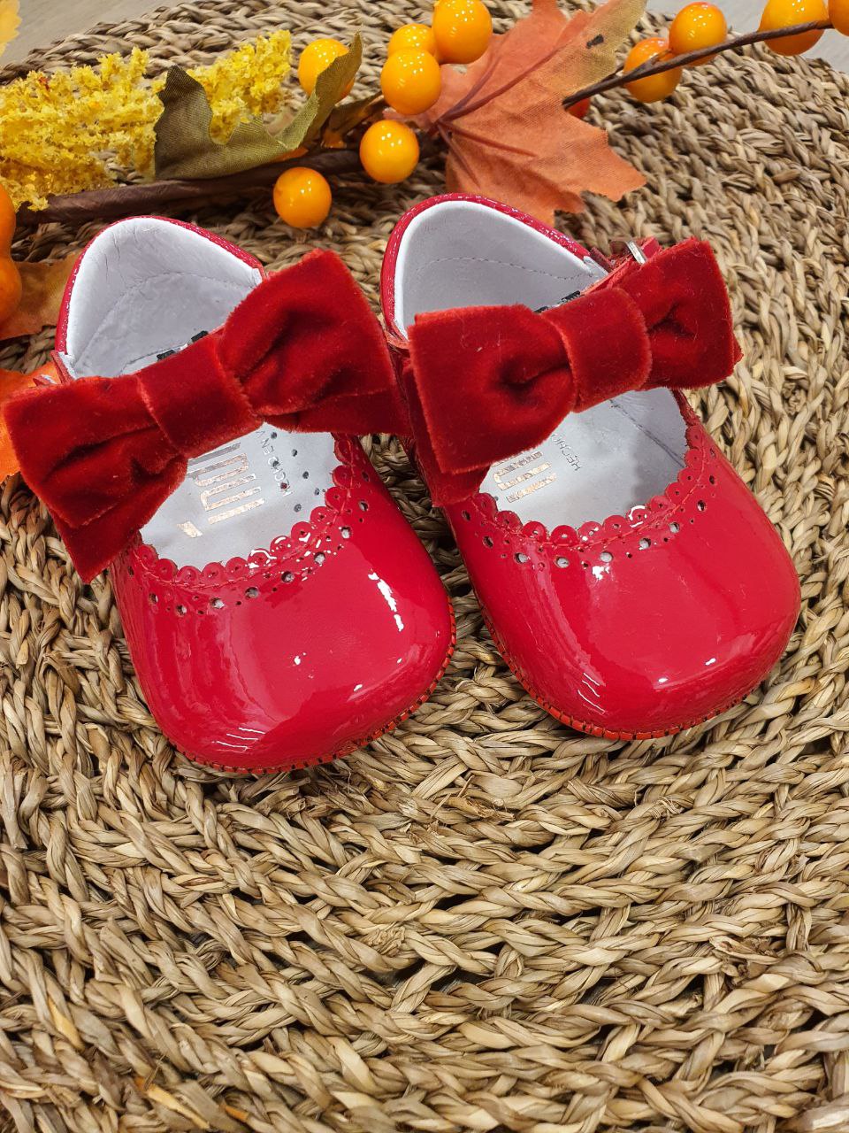 BAMBOLINA LUCIDA CON FIOCCO IN VELLUTO ROSSO INDICE