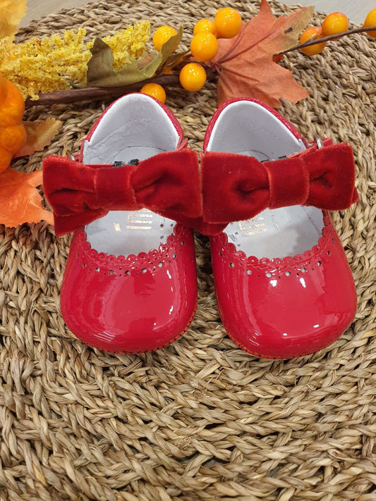 BAMBOLINA LUCIDA CON FIOCCO IN VELLUTO ROSSO INDICE