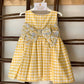 VESTITO QUADRI CON FIOCCO FLOREALE DEL SUR