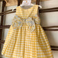 VESTITO QUADRI CON FIOCCO FLOREALE DEL SUR