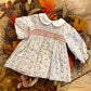 ABITO PUNTO SMOCK