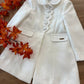 CAPPOTTO BIANCO CON COLLETTO E BOTTONI RIVESTITI