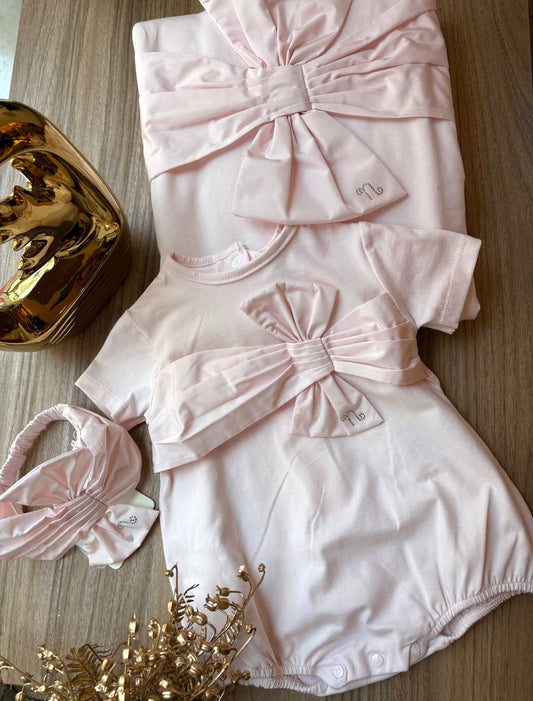 PAGLIACCETTO ROSA CON FIOCCO NANÁN