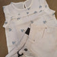Completo canotta e shorts di Jeans bianco